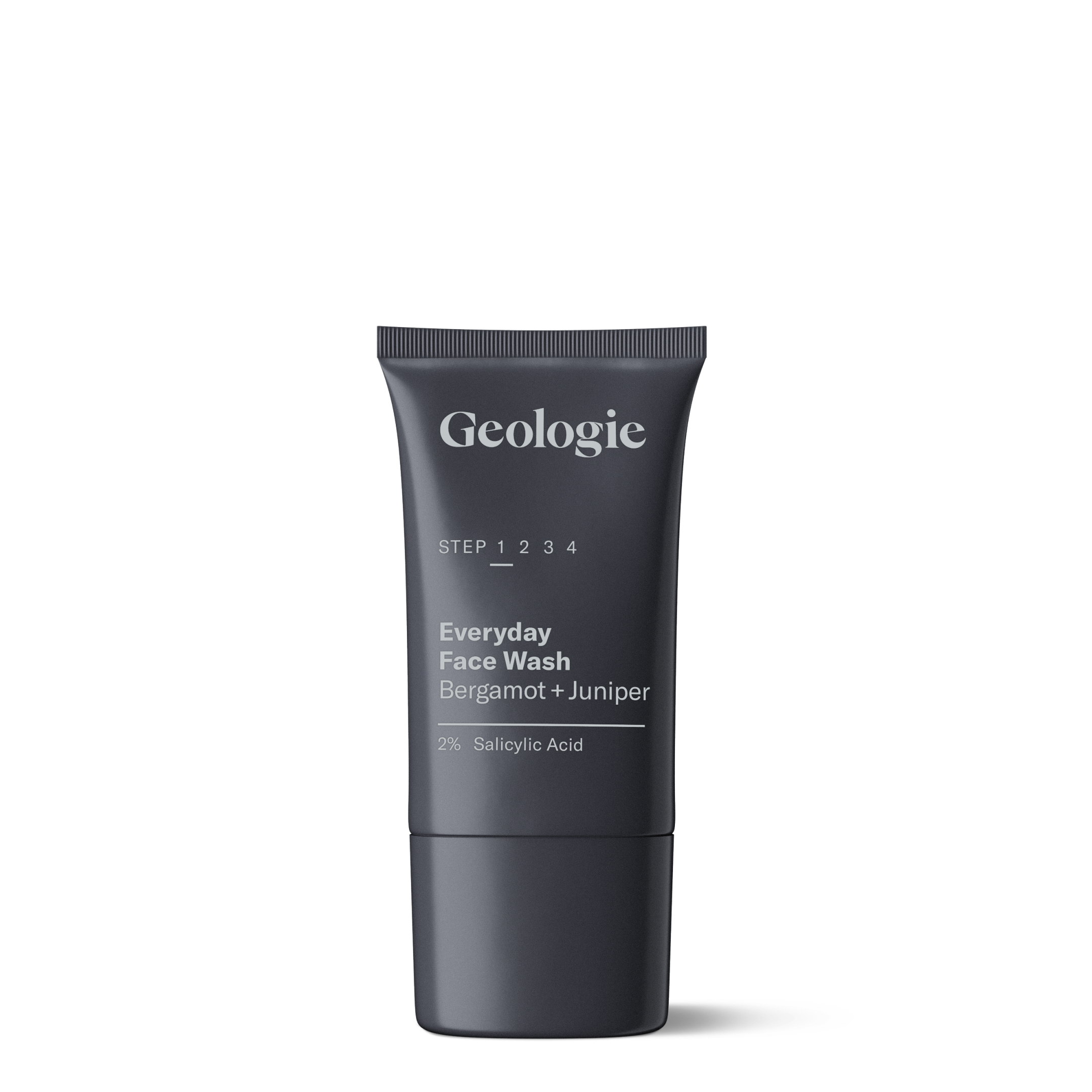 Tube of Geologie Salicylic Acid Face Wash with bergamot and juniper, containing 2% salicylic acid, against a dark background.
